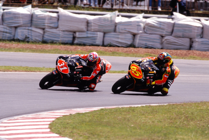 Loris Capirossi (65) e Tetsuya Harada (31)