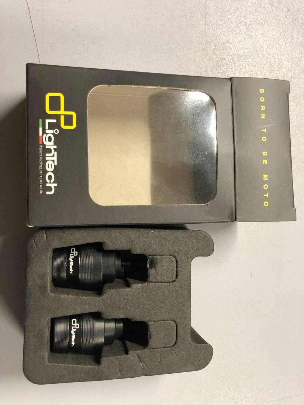 Coppia contrappesi manubrio Lightech colore nero.