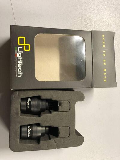 Coppia contrappesi manubrio Lightech colore nero.