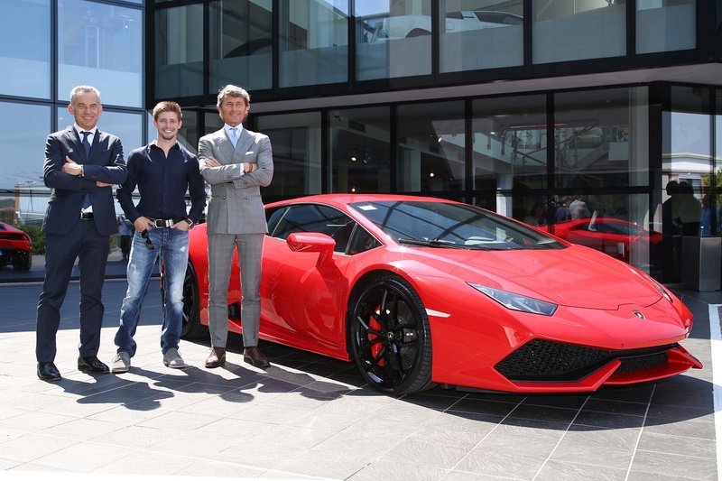 Da sinistra, Maurizio Reggiani, Casey Stoner e Stephan WInkelmann