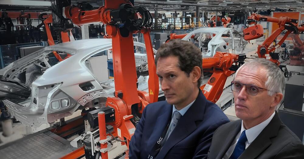 Ma &egrave; vero che con le auto elettriche Elkann e Tavares ci perdono? Intanto il Gruppo (ex Fiat) cede il gioiello dell&rsquo;automazione Comau. Ira dei sindacati, ma il Governo...