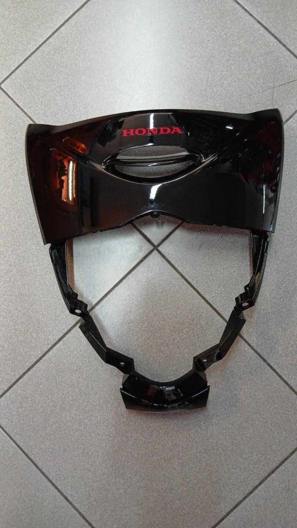 64300KTF910ZA Mascherina anteriore SH 125/150 Honda