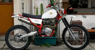 Honda Tiger Solace Motorcycle: quando la scrambler incontra l'enduro